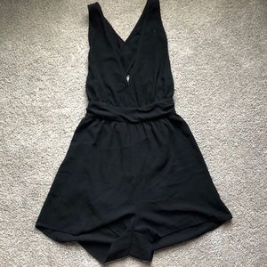 Black halter romper with tie in the back